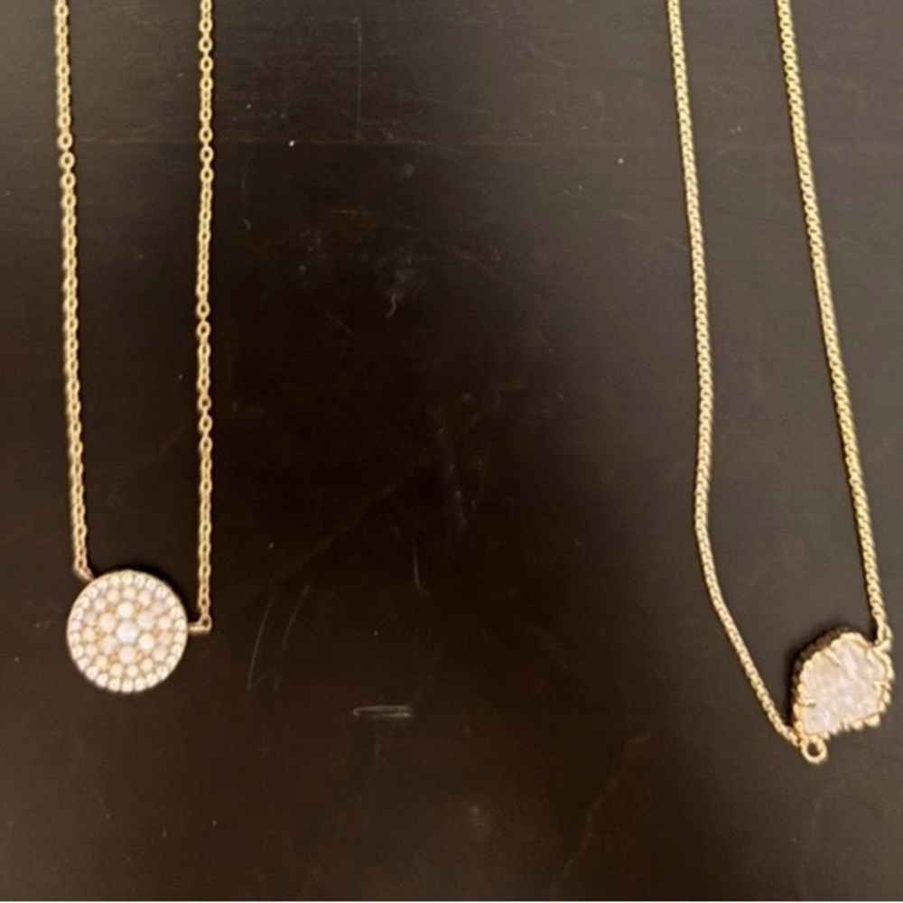 two Kendra Scott necklaces in gold